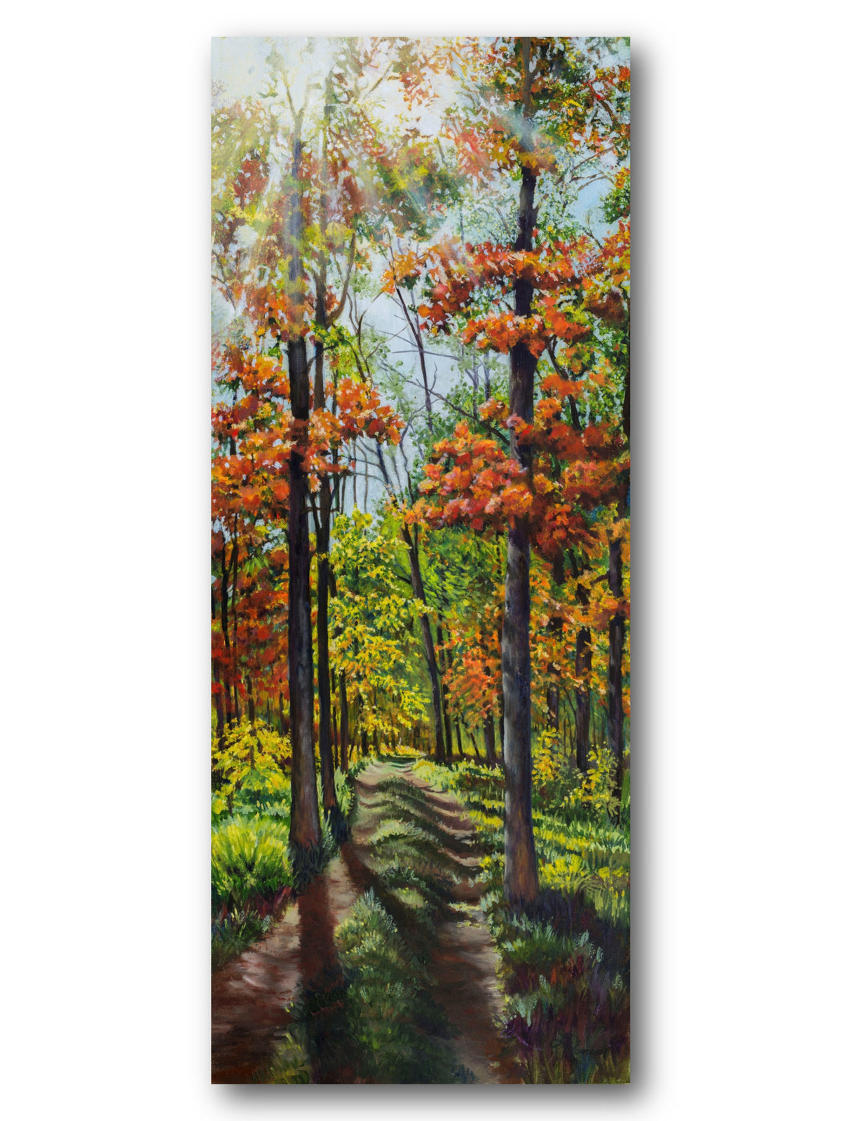 A vertical canvas painting of a forest path lined with trees in autumn colors, featuring green, yellow, orange, and red foliage, shown against a plain white background.